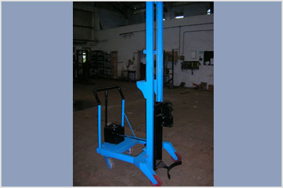 Drum Stacker With Auto Gripper